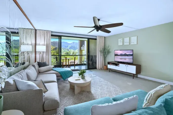 Living Room with Bay View
 Panoramic paradise. Floor-to-ceiling windows open to breathtaking Hanalei Bay views — your serene base on Kauai’s North Shore.