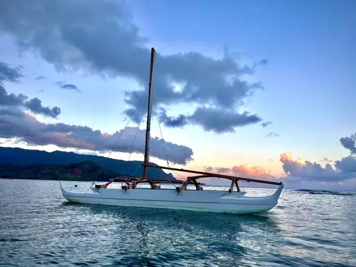 Gentle waters  and beautiful sunsets at the Puu Poa Beach 