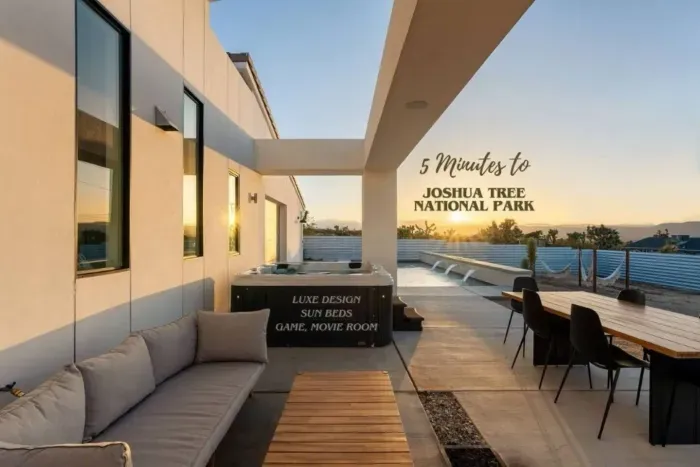  Luxe design. Desert nights. Just 5 minutes from Joshua Tree National Park — soak under the stars, wine in hand.