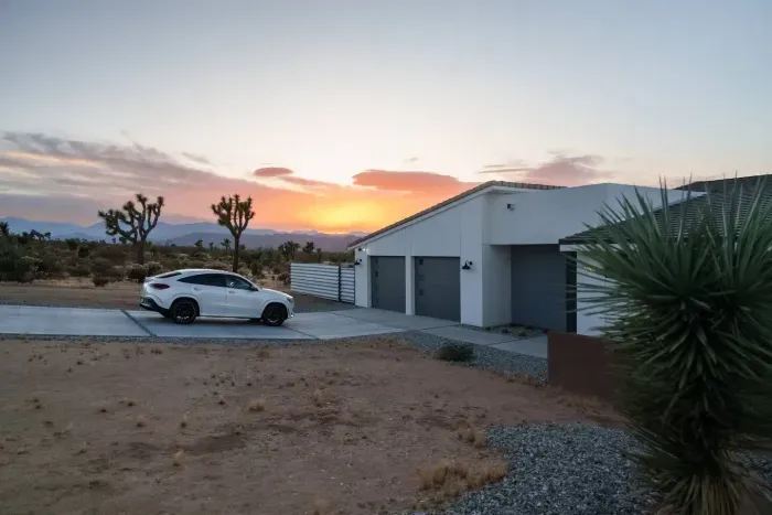  Arrival feels like exhale. Watch the sun set behind the Joshua Trees as the desert quiet welcomes you home.