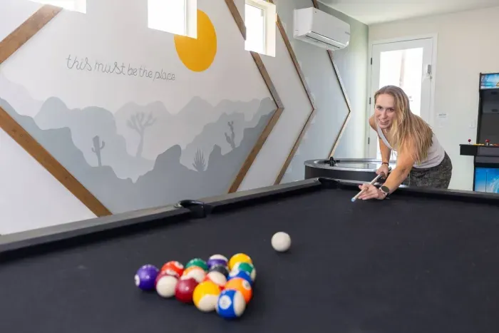 Desert-inspired play. Challenge your crew to a game in the Joshua Tree–themed lounge 