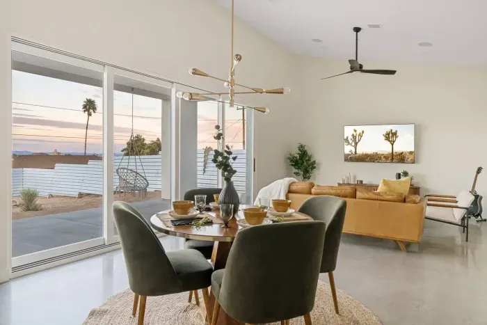 ☀️ Gather & glow. Sunlight floods the open-concept living space — dine, unwind, and savor every golden hour together.