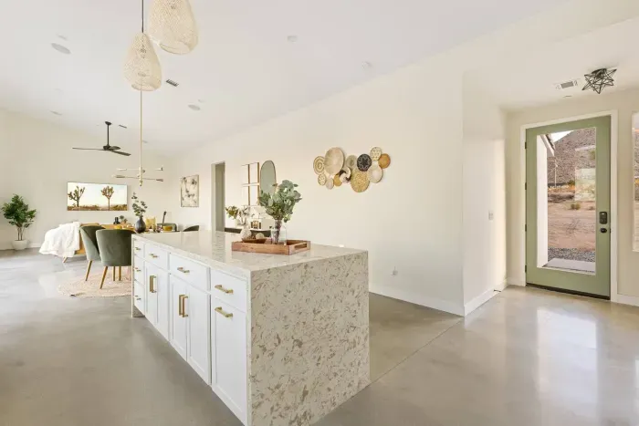 Our kitchen island with gorgeous waterfall counters