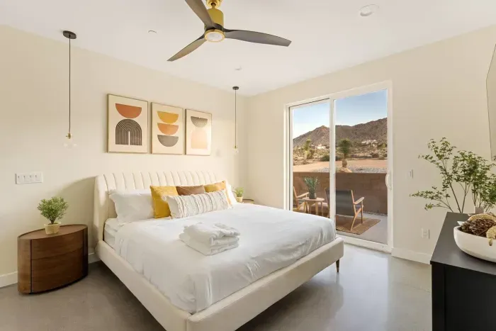 King bed in the Main bedroom with attached bathroom and private patio