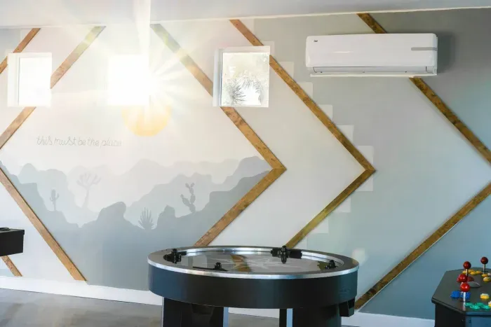 Mini split in the game room to ensure you're cool in summer and warm in winter