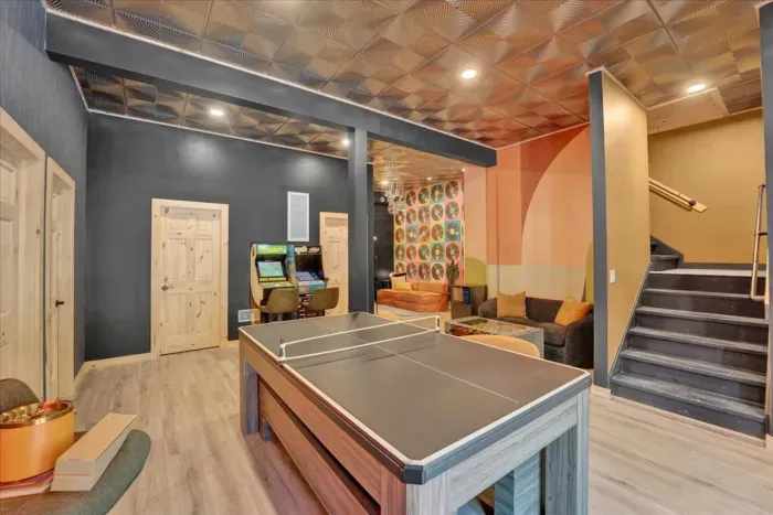 Game Room Retreat: Challenge friends at the ping-pong table in a vibrant, retro-inspired space!