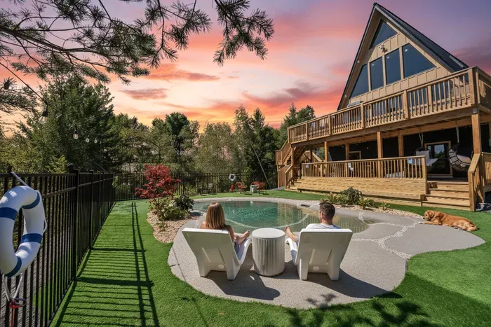 A-frame retreat with private pool, multi-level decks & sunset views