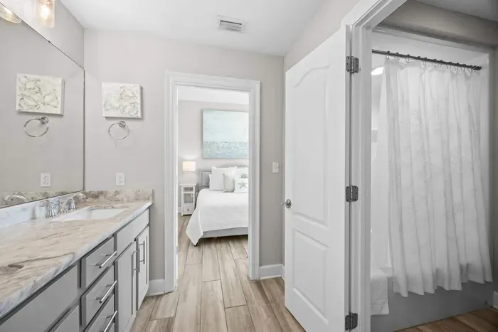 Adjoining bathroom connects guest bedrooms