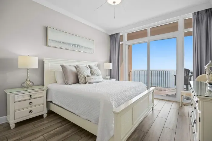 Primary bedroom with balcony access