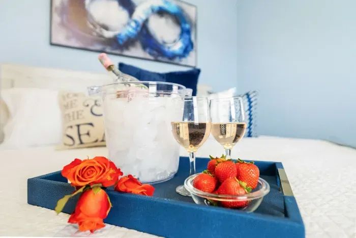 Sip, savor, and soak in the salty breeze. Where coastal charm meets quiet comfort.