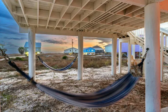  Swing the night away! Hammocks create the perfect relaxation beneath the house.