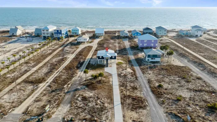 From the front door to the shoreline, Blissful Shores is just a short stroll from the beach along a private sand pathway.