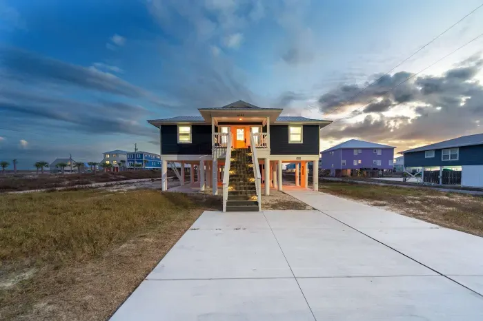 Blissful Shores at sunset with soft skies, quiet surroundings, and a peaceful coastal escape far from the crowds.