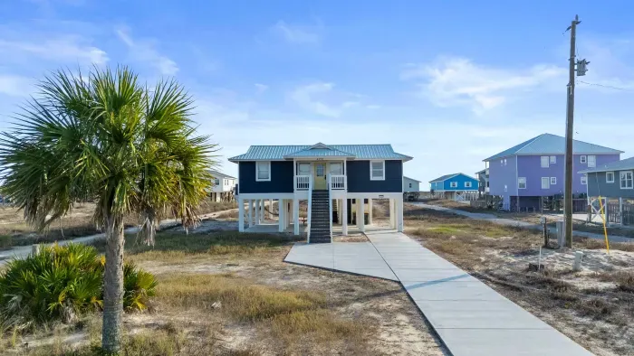 Blissful Shores, a quiet, peaceful retreat tucked away from the crowds, where calm coastal living and easy beach days take center stage.