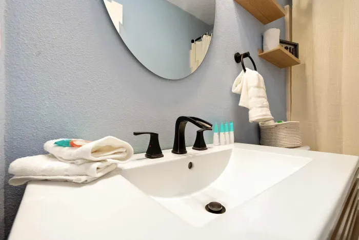 Guest Bathroom: Light, fresh, and designed with comfort in mind. A relaxing retreat just steps from the living room.