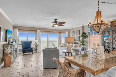 Floor-to-ceiling windows viewing the Gulf