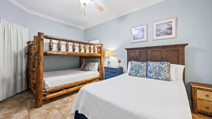 2nd guest bedroom with 1 queen and 1 queen over queen bunk