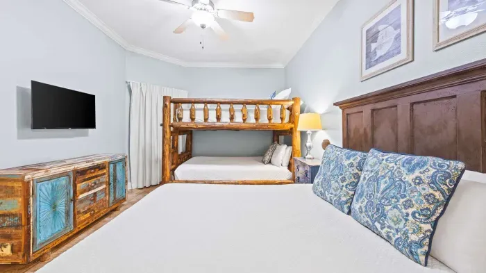 2nd guest bedroom with 1 queen and 1 queen over queen bunk