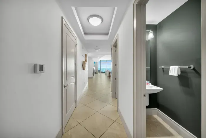 Hallway looking into guest half bathroom