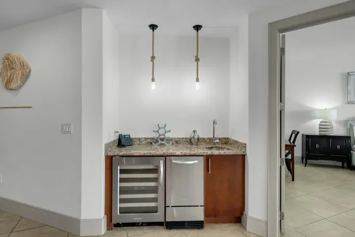 Wet bar with ice maker and wine cooler