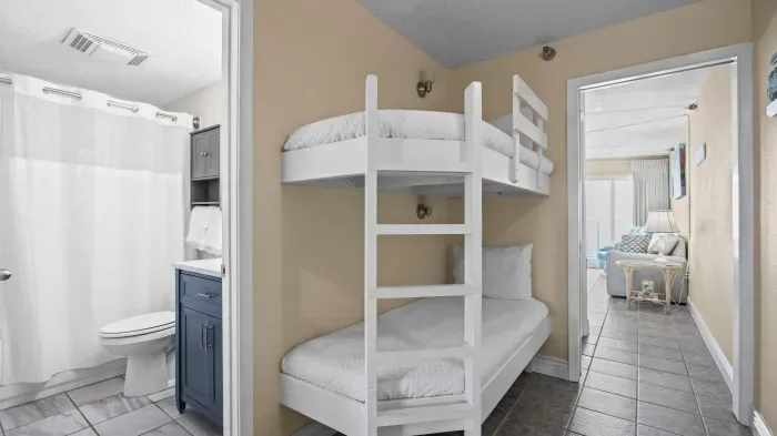 Hallway features twin over twin bunk