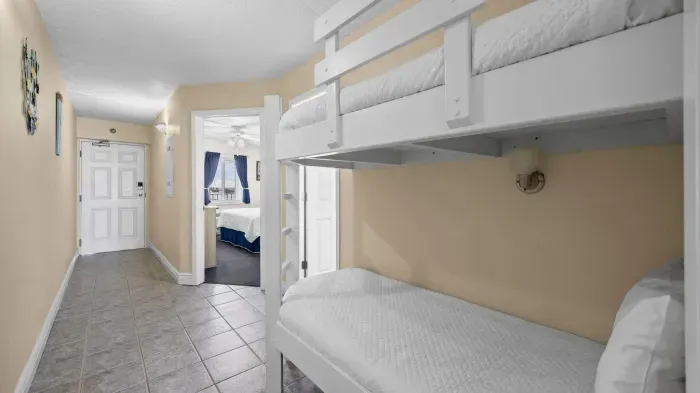 Hallway bunks looking towards entrance to the unit