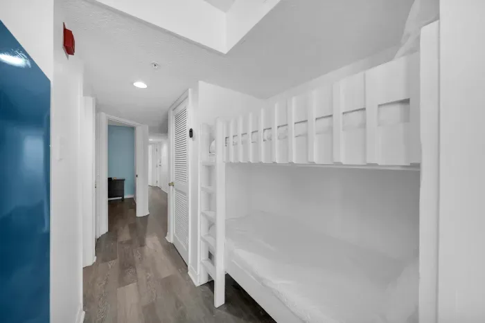 Built in twin over twin bunks in hallway