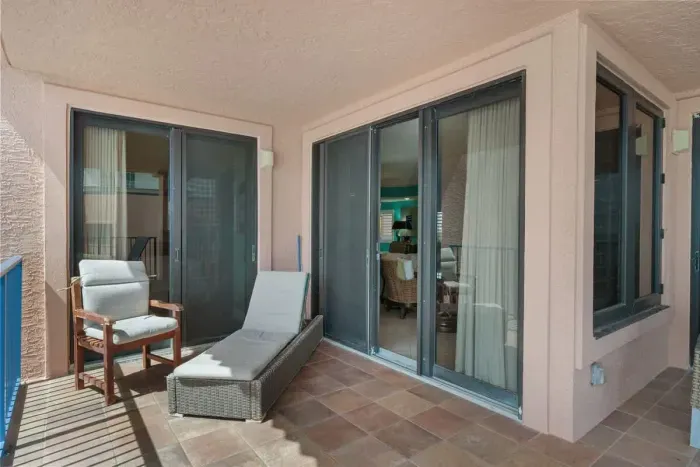 Balcony with multiple doors to access unit