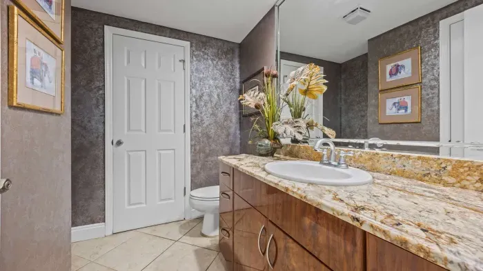 Half bathroom off hallway