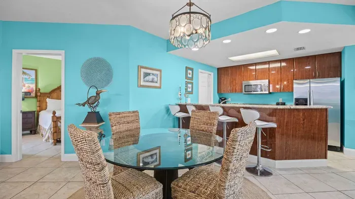 Breakfast bar seats 4 and dining table seats 4
