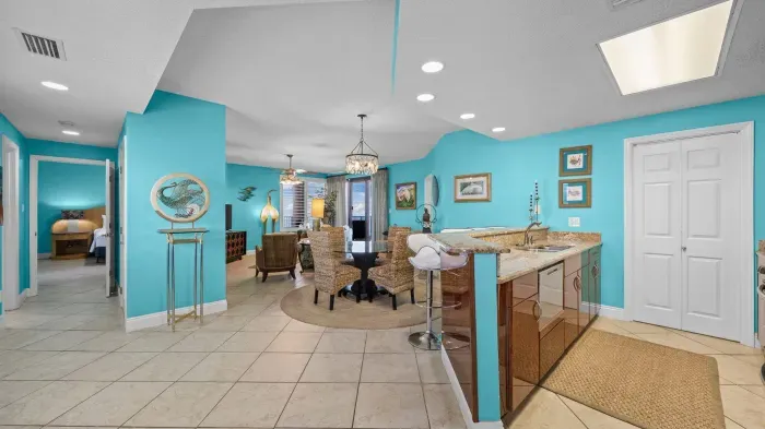 Kitchen overlooks dining and living room
