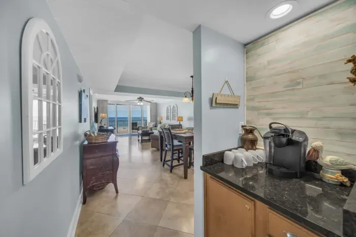 Hallway off kitchen with coffee bar