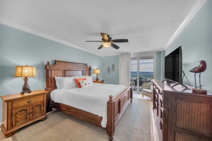 Primary bedroom with access to balcony