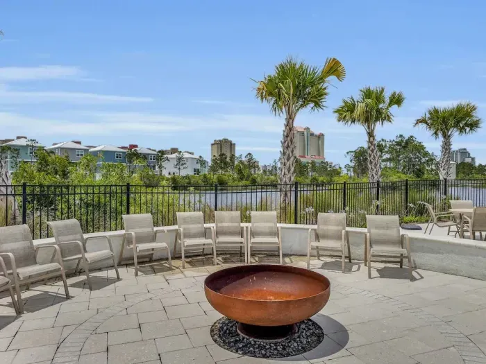 Community fire pit area near pool