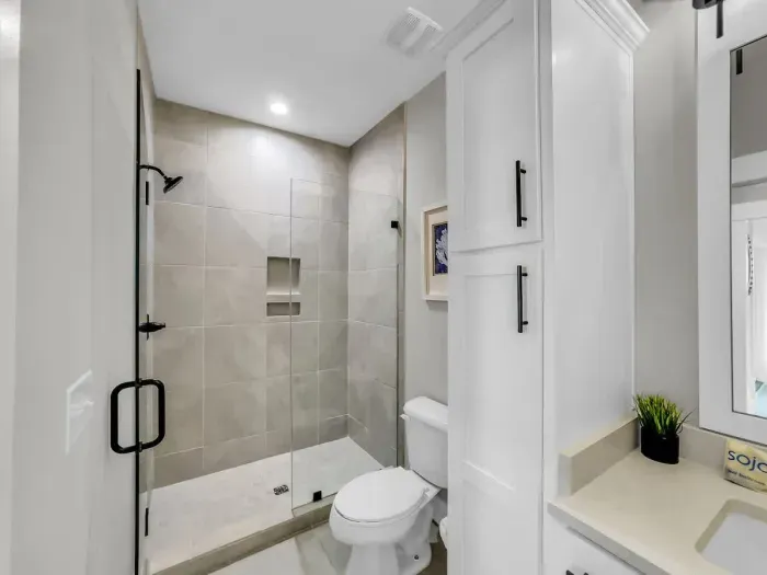 Downstair bathroom features walk in shower