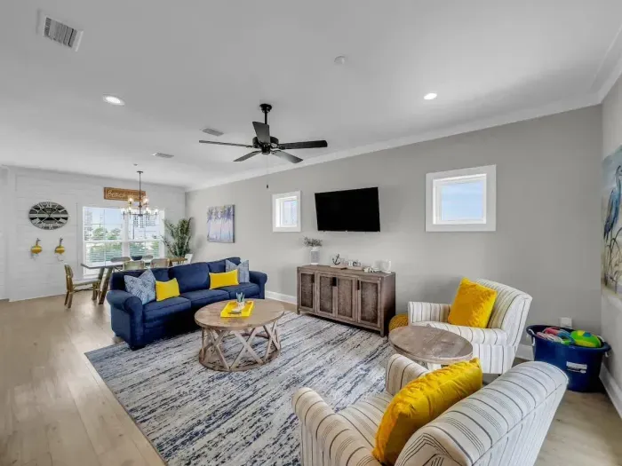 Living room opens into dining area