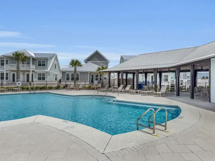 Covered seating area of community pool