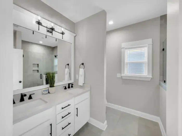 Primary bathroom features dual vanity
