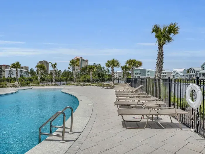 Community pool with lake view