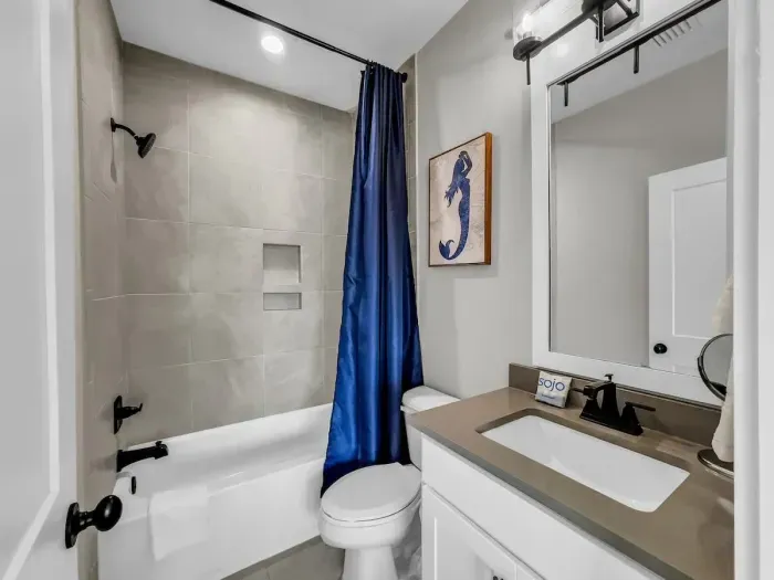 Ensuite bathroom off first guest bedroom