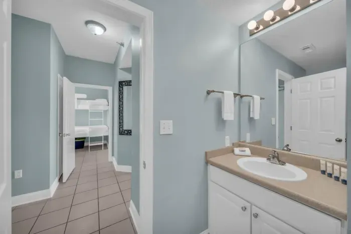 A second full bath in the hallway caters to the Bunk Room and drop-in guests.