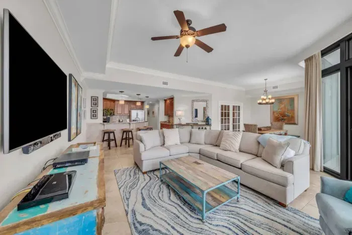 Living room opens to kitchen and dining area