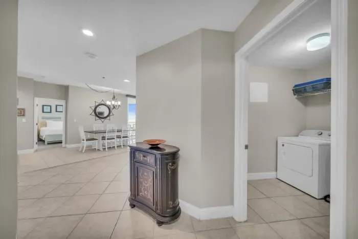 Hallway View of Dining Space and Laundry Room