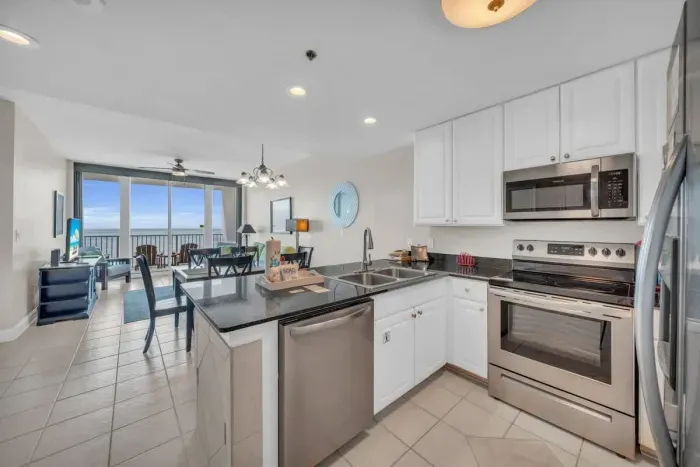 Open concept kitchen opens into the dining and living rooms