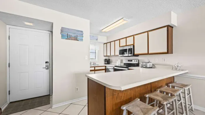 Entrance to unit off kitchen