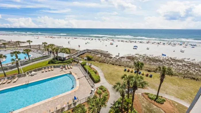 Pool and beach view from balcony
