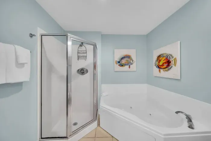 Primary bathroom with jetted tub and walk in shower