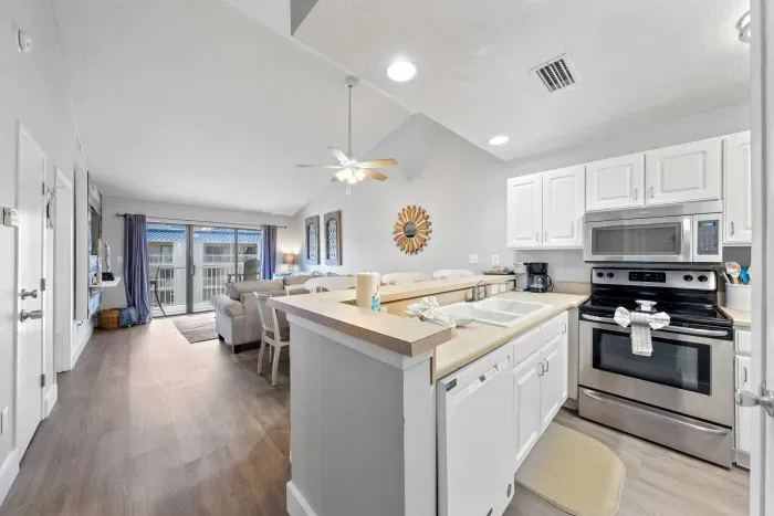 Kitchen opens into living area