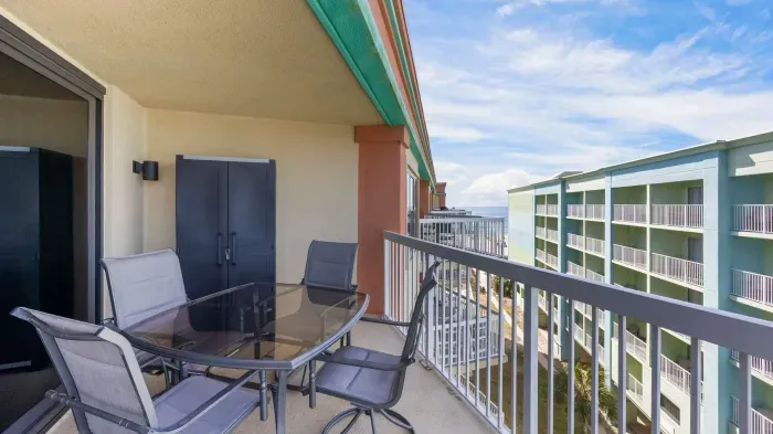 Private balcony with dining seating for 4