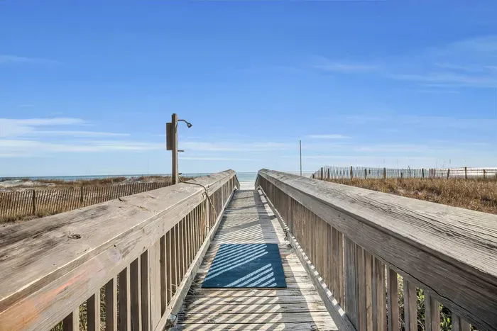 Boardwalk with sand wash station